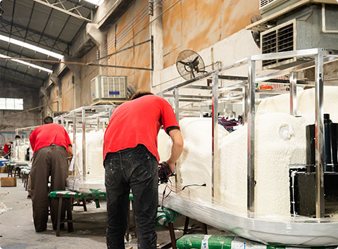 technicans in Voomig are putting together all the nozzles, pipes and pumps